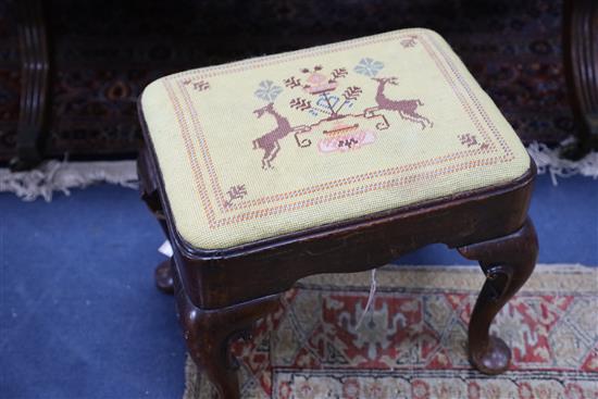 An early 18th century red walnut stool, W.1ft 6in. D.1ft 2in. H.1ft 4in.